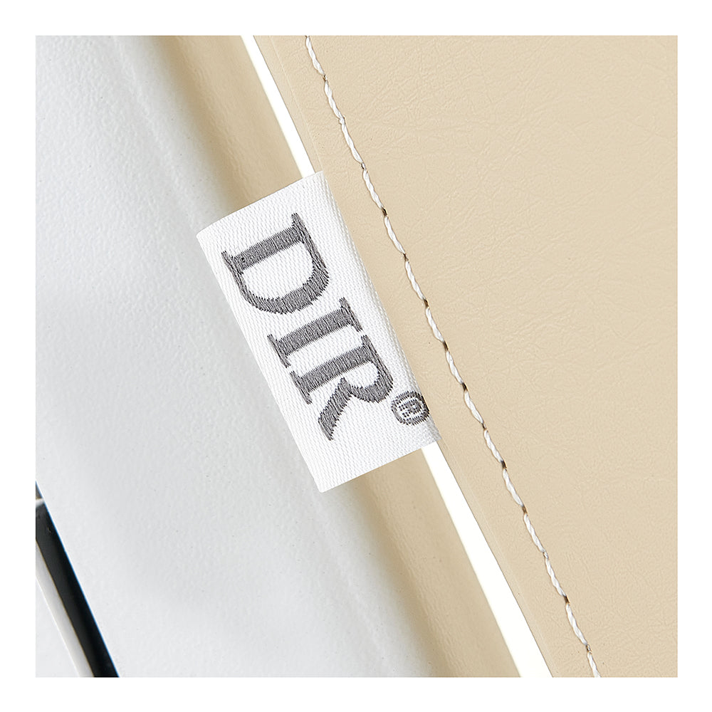 White DIR® label on beige Tranquility 4 Motors Electric Medical Spa Table upholstery.