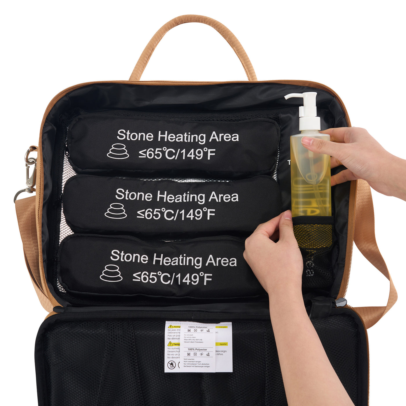 Open black backpack with labeled compartments and a hand holding a bottle.