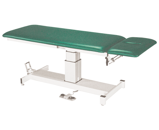 Armedica AM-SP 200 Treatment Table with two-section top, headrest, and foot pedal controls.