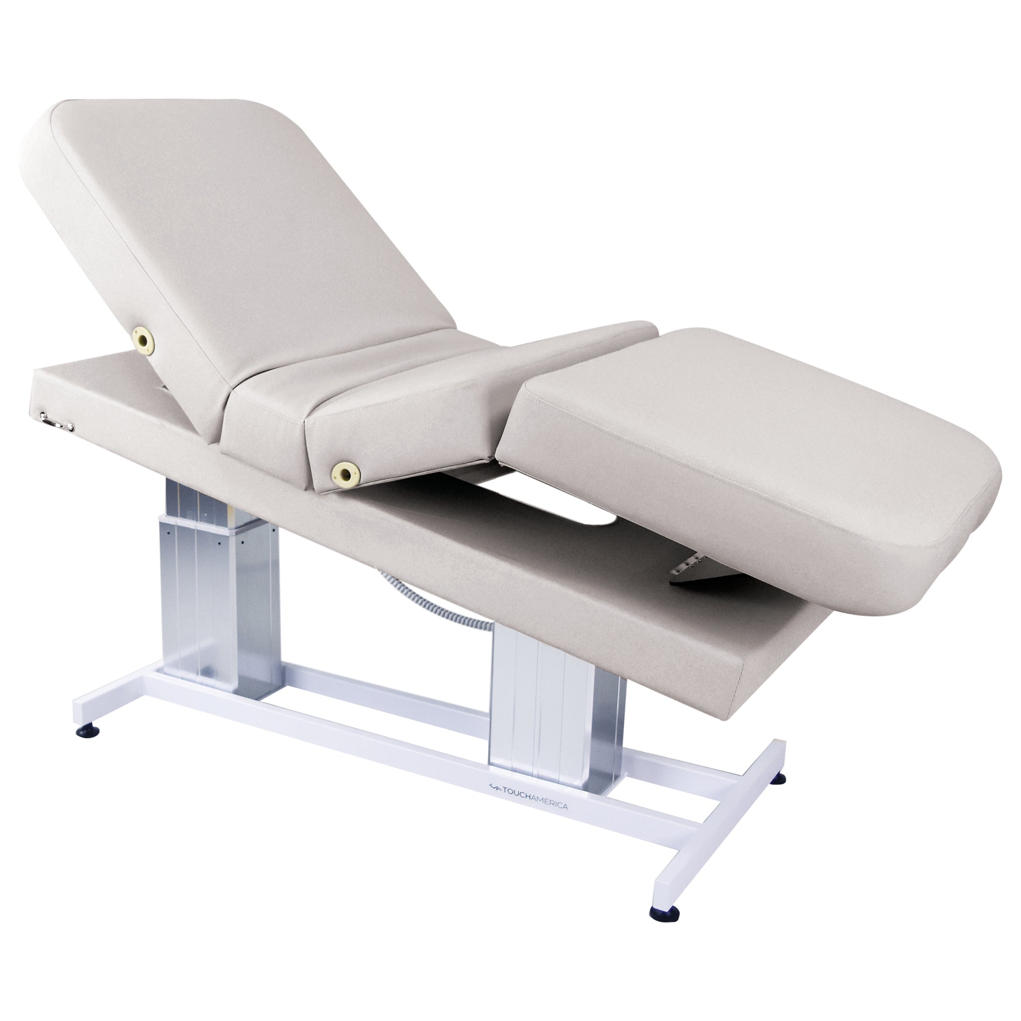 TouchAmerica Atlas Classic beige exam table with cushion and Trendelenburg position feature.