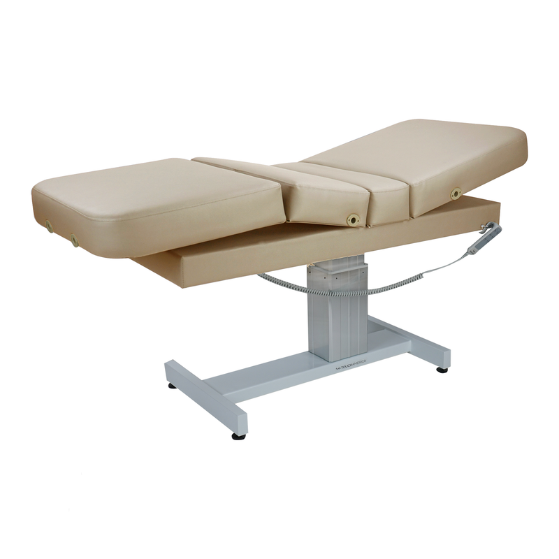TouchAmerica VENETIAN POWERTILT beige massage table with metal base and remote control.