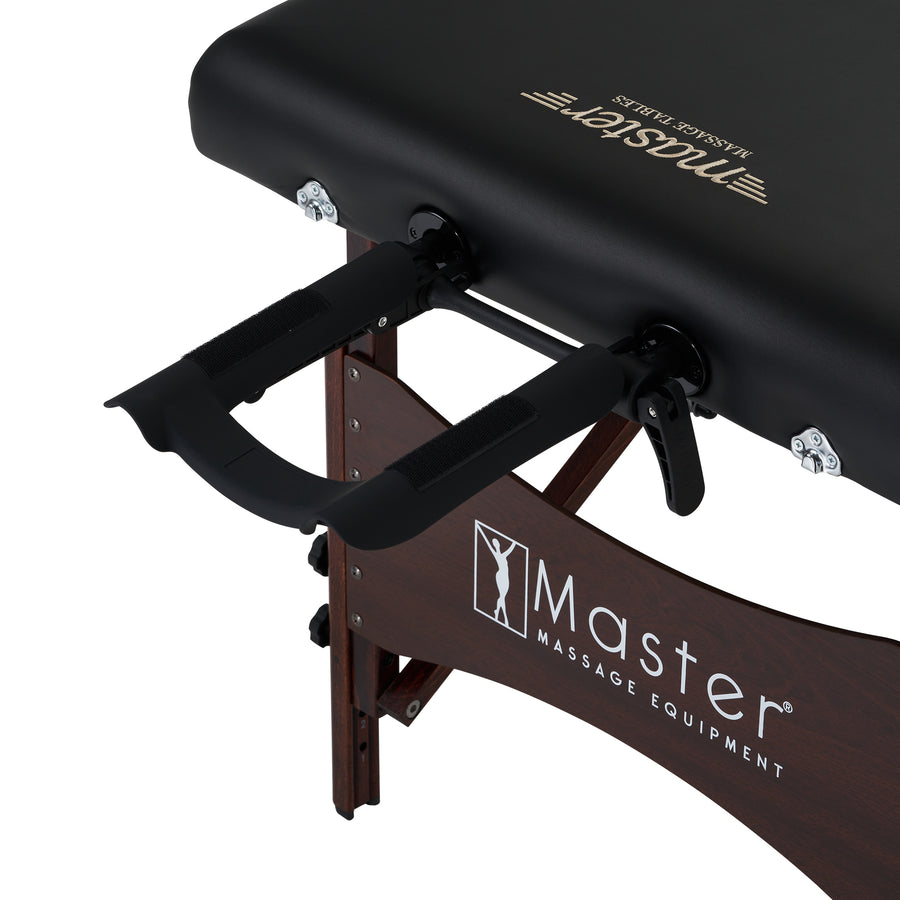 Close-up of Master Massage ROMA Table with THERMA-TOP heated system and logo.