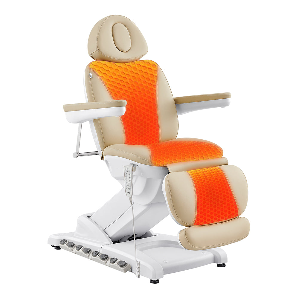 Apollo II Electric Beauty Bed by DIR in beige/orange with remote and padded armrests.