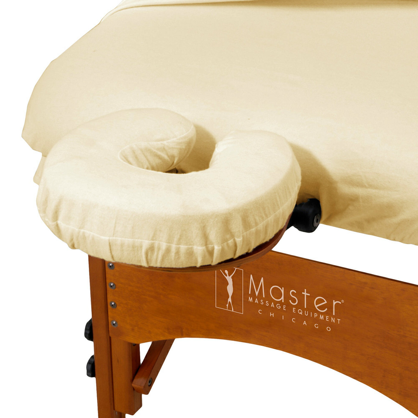 Massage table with beige cushion featuring Master Massage Equipment Chicago logo.