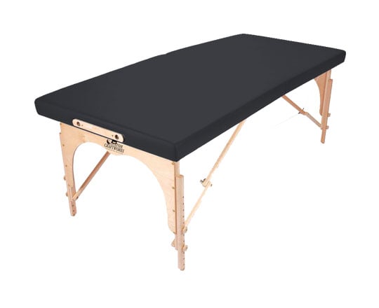 Custom Craftworks ALEXANDER TECHNIQUE Table with padded top and sturdy birch legs, angled view.