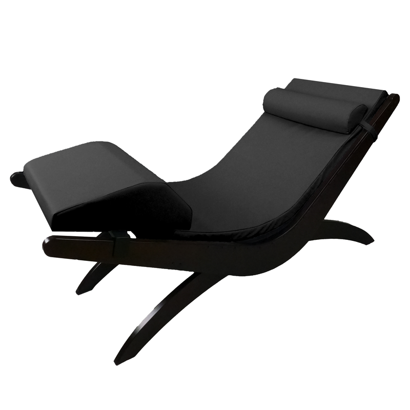TouchAmerica BREATH Pedi-Lounge: modern black lounge with curved legs and cushioned headrest.