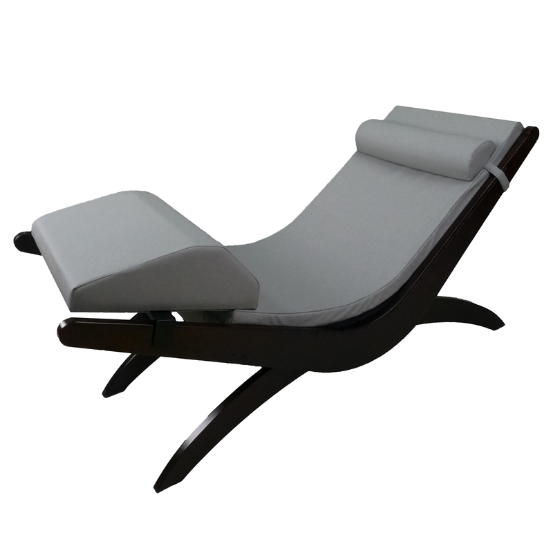 TouchAmerica BREATH Pedi-Lounge: modern lounge chair with curved wood frame and light gray cushioning.