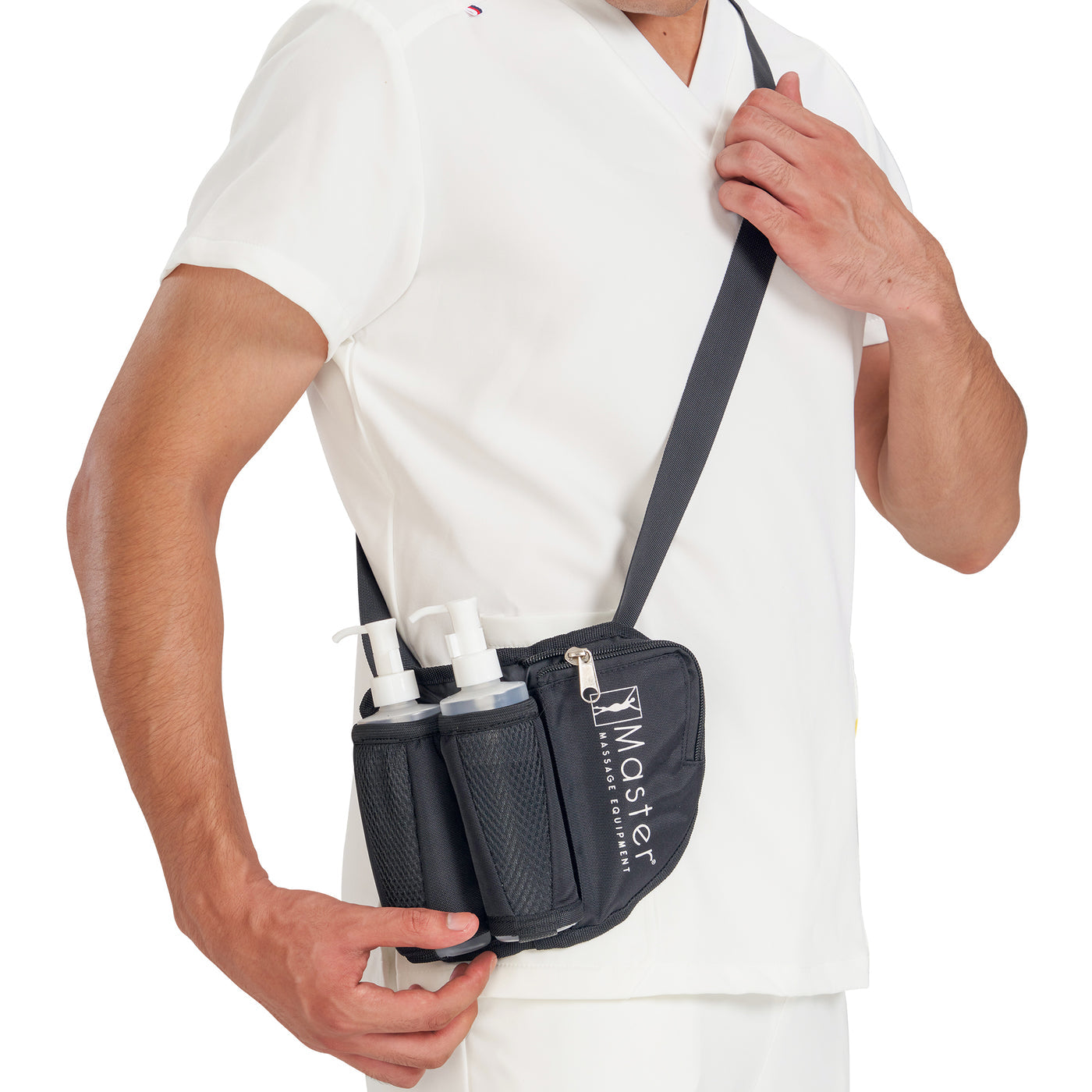 Person holding Master Massage Double Bottle Massage Oil Holster Bag on a white background
