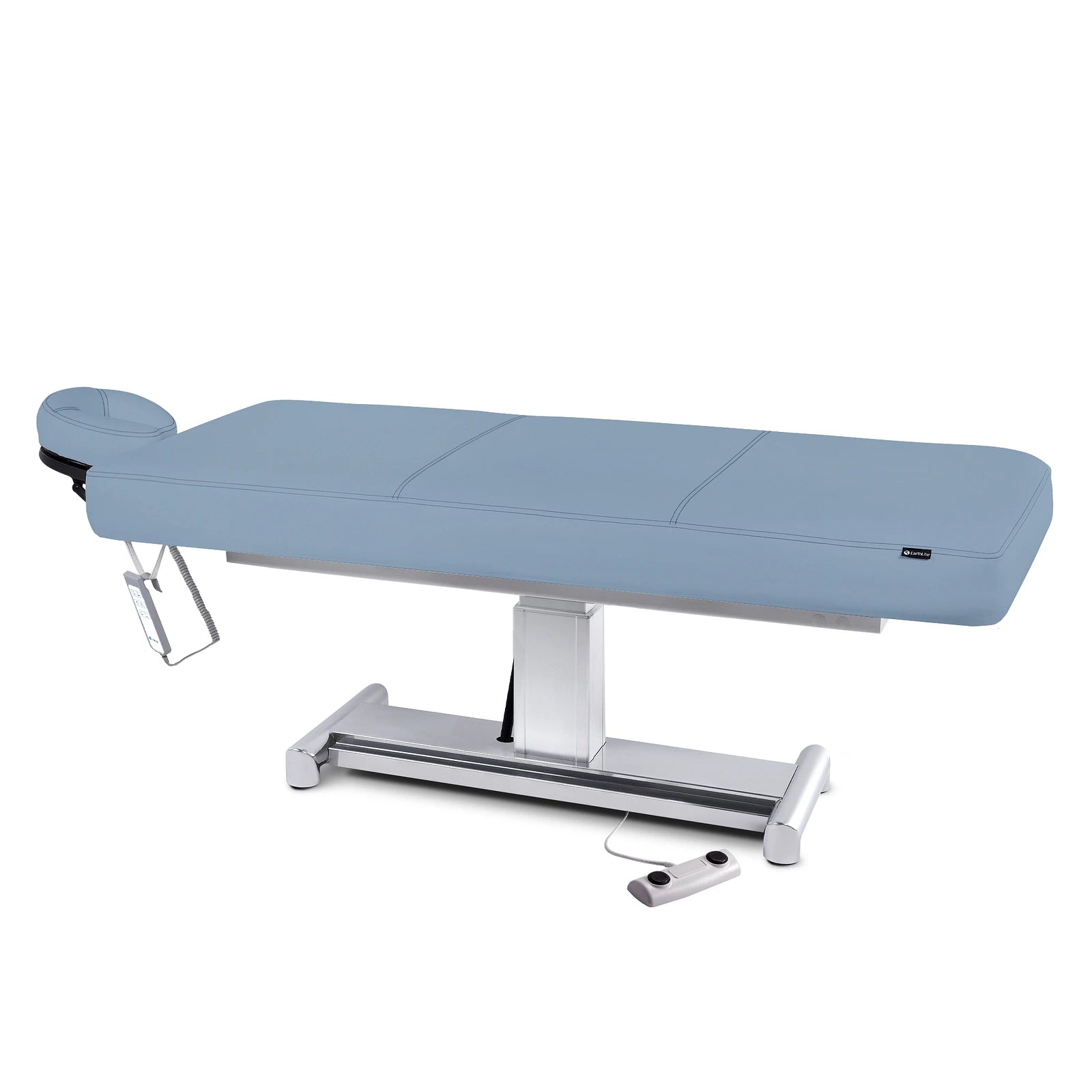 EarthLite EVEREST LX ADA treatment table with metal base and attached remote control.