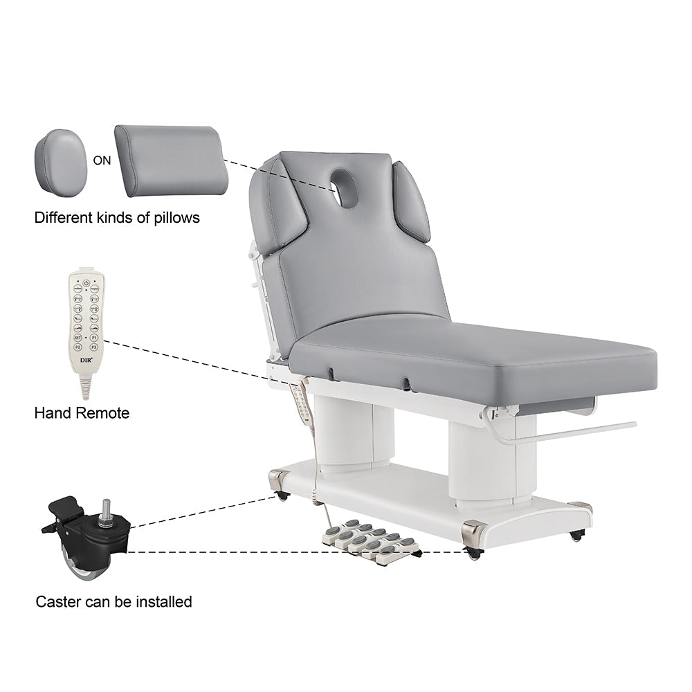 Medical examination table with various attachments including pillows, a remote control, and casters on a white background.