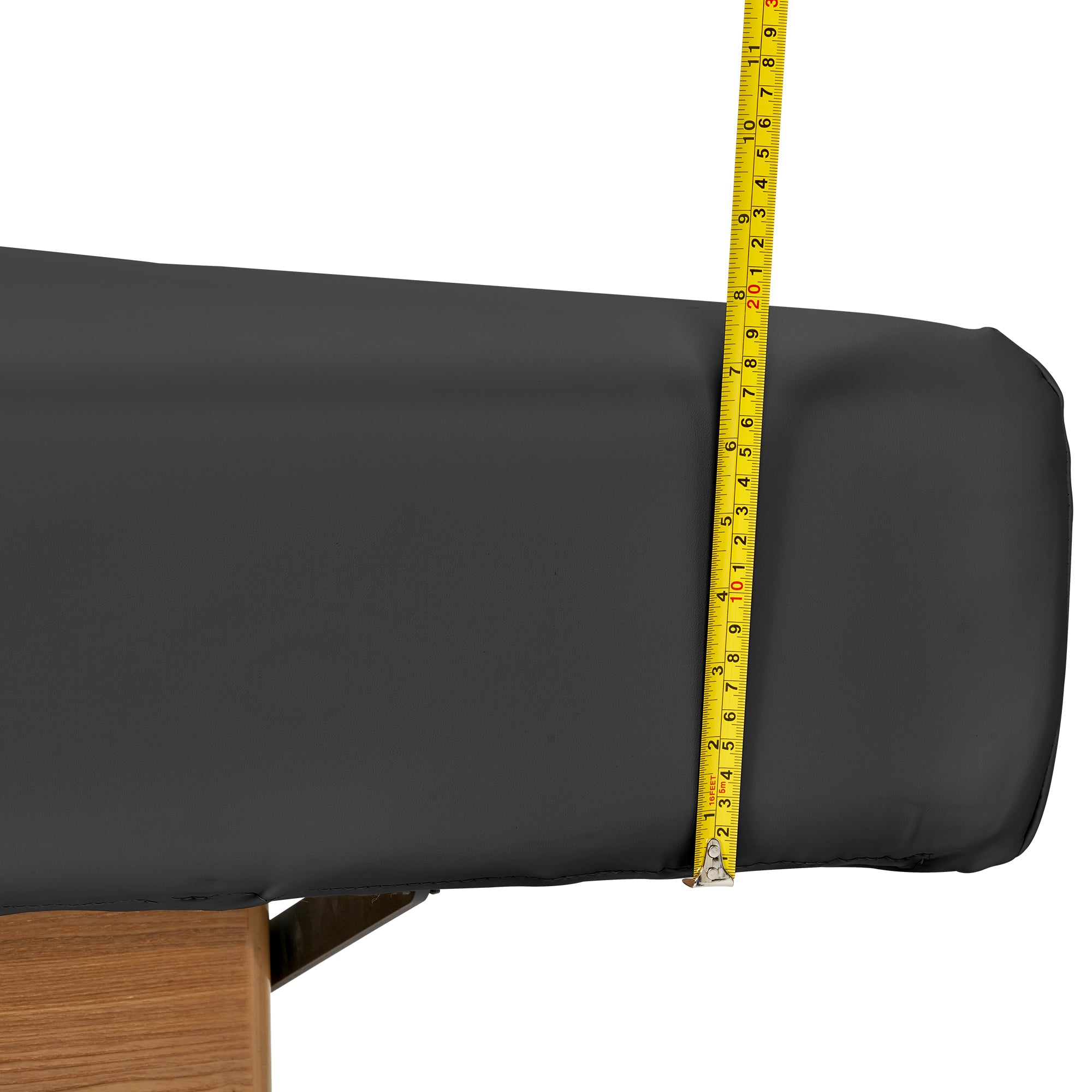 A measuring tape on a Master Massage Atlas Liftback Electric Lift Spa Bed with black cushions.