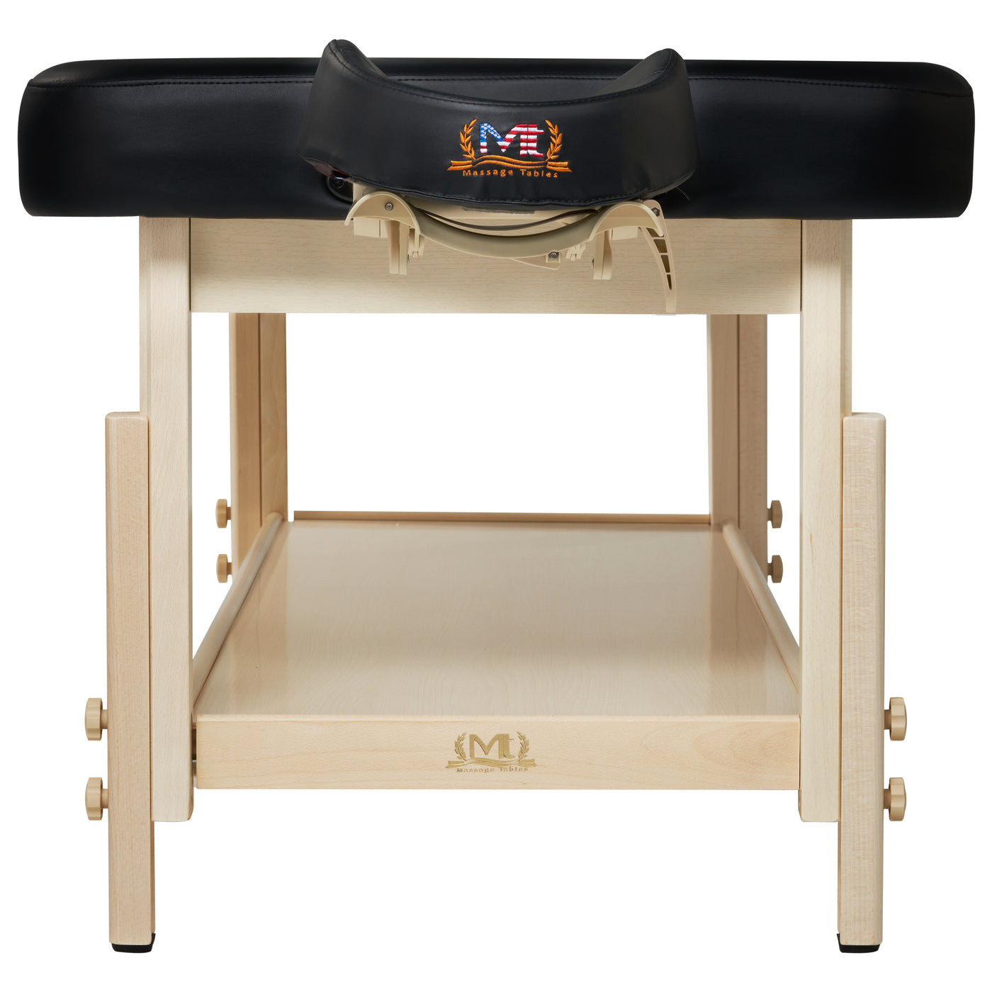 The MT HARVEY TILT massage table features a black headrest and lower storage shelf.