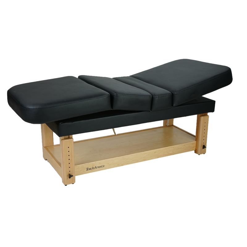 TouchAmerica STATIONARY MULTIPRO Table with padded sections and wooden storage shelf.