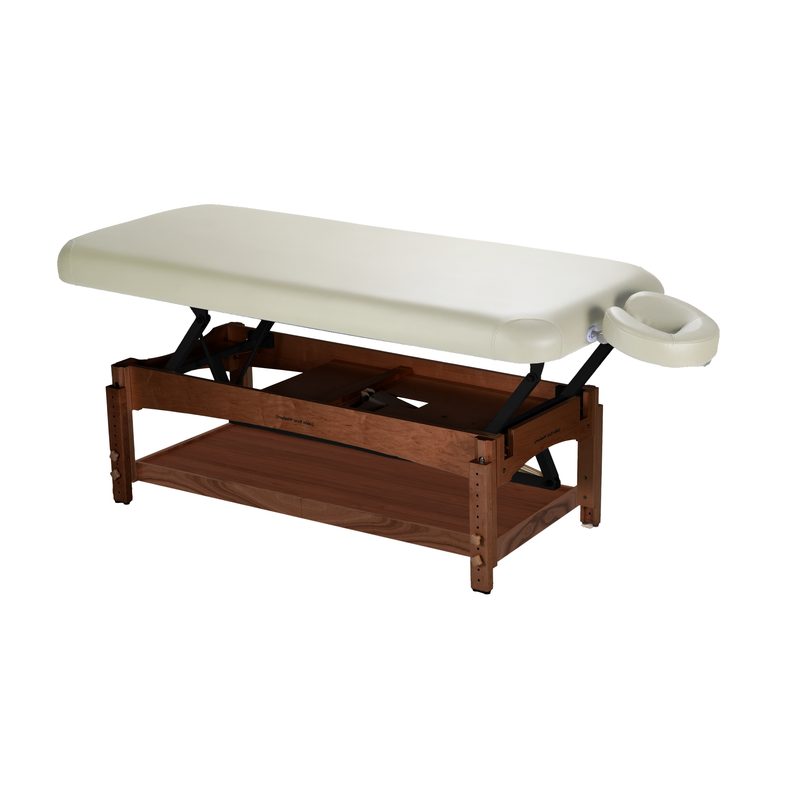 TouchAmerica OLYMPUS FLAT ADA electric lift table with cream padding, wood base, adjustable cradle.