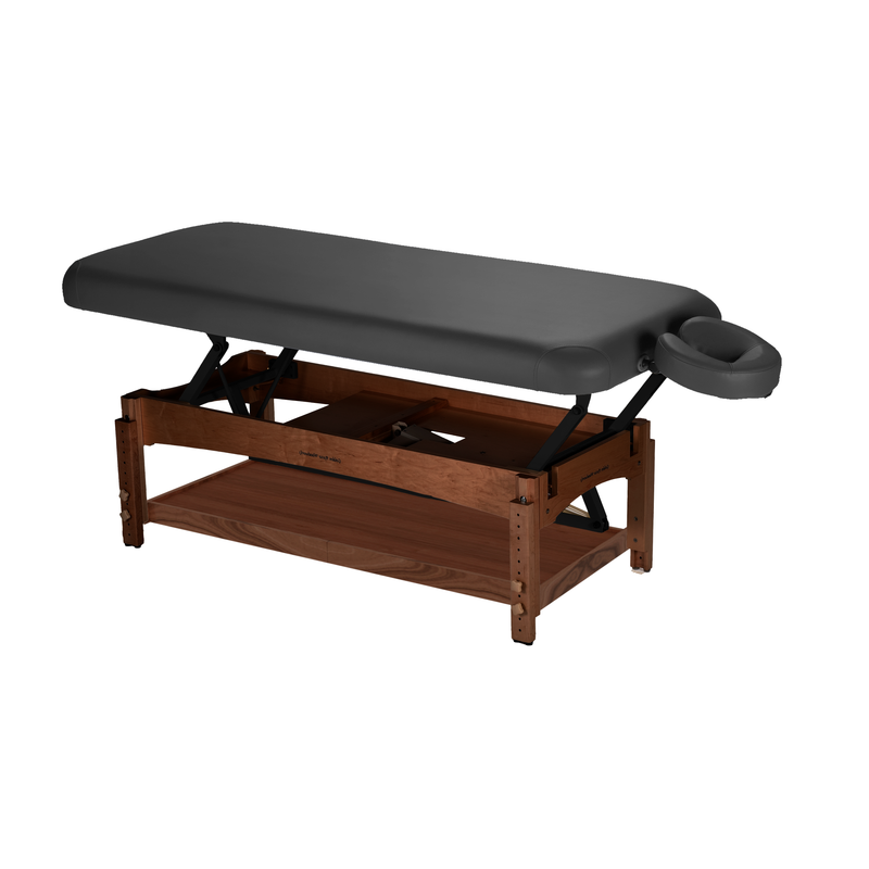 TouchAmerica OLYMPUS FLAT electric lift table with wooden base and adjustable headrest.