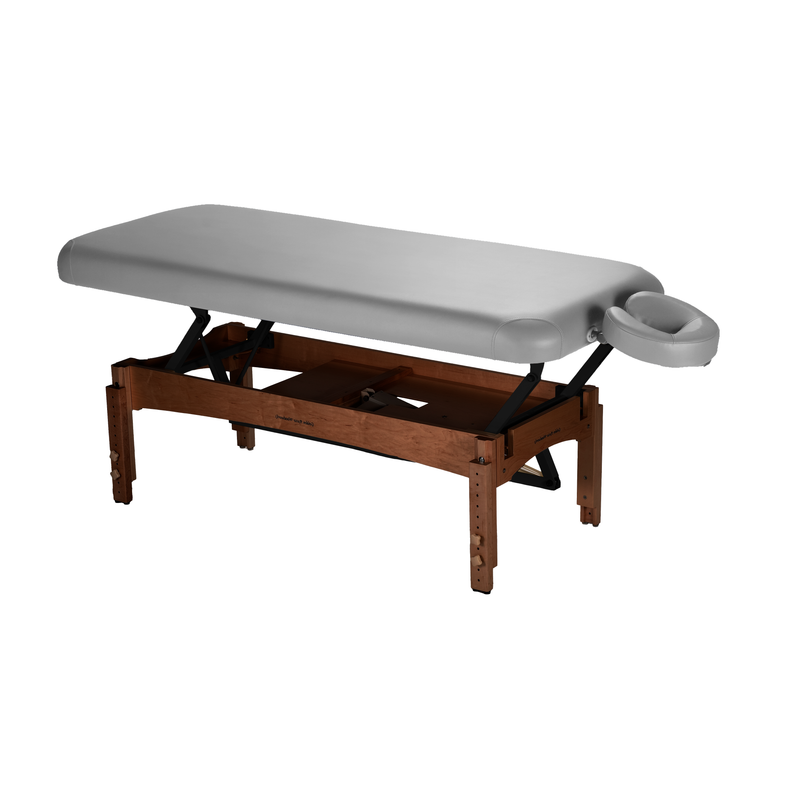 TouchAmerica OLYMPUS FLAT electric lift table, gray, wood legs, with adjustable face cradle.