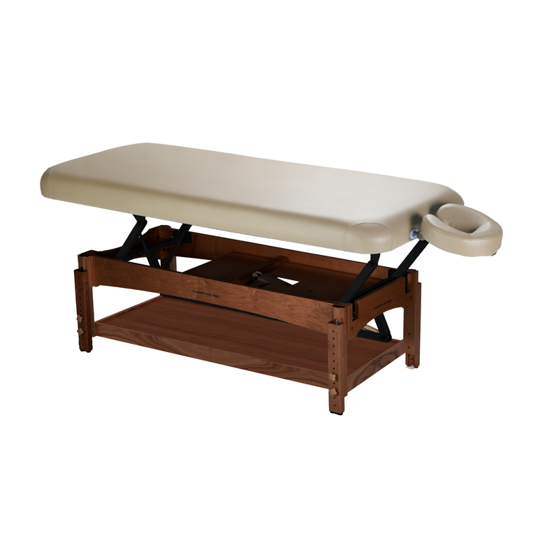 TouchAmerica OLYMPUS FLAT electric lift table with beige padding and adjustable face cradle.