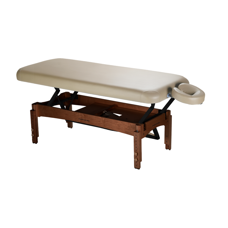 TouchAmerica OLYMPUS FLAT electric lift table with face cradle and adjustable wooden legs.