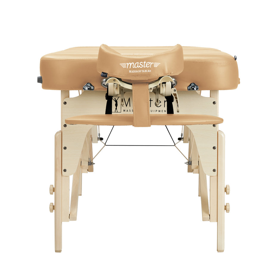 The Master Massage PHOENIX Therma-Top Table has light wood legs, tan padding, and a face cradle.
