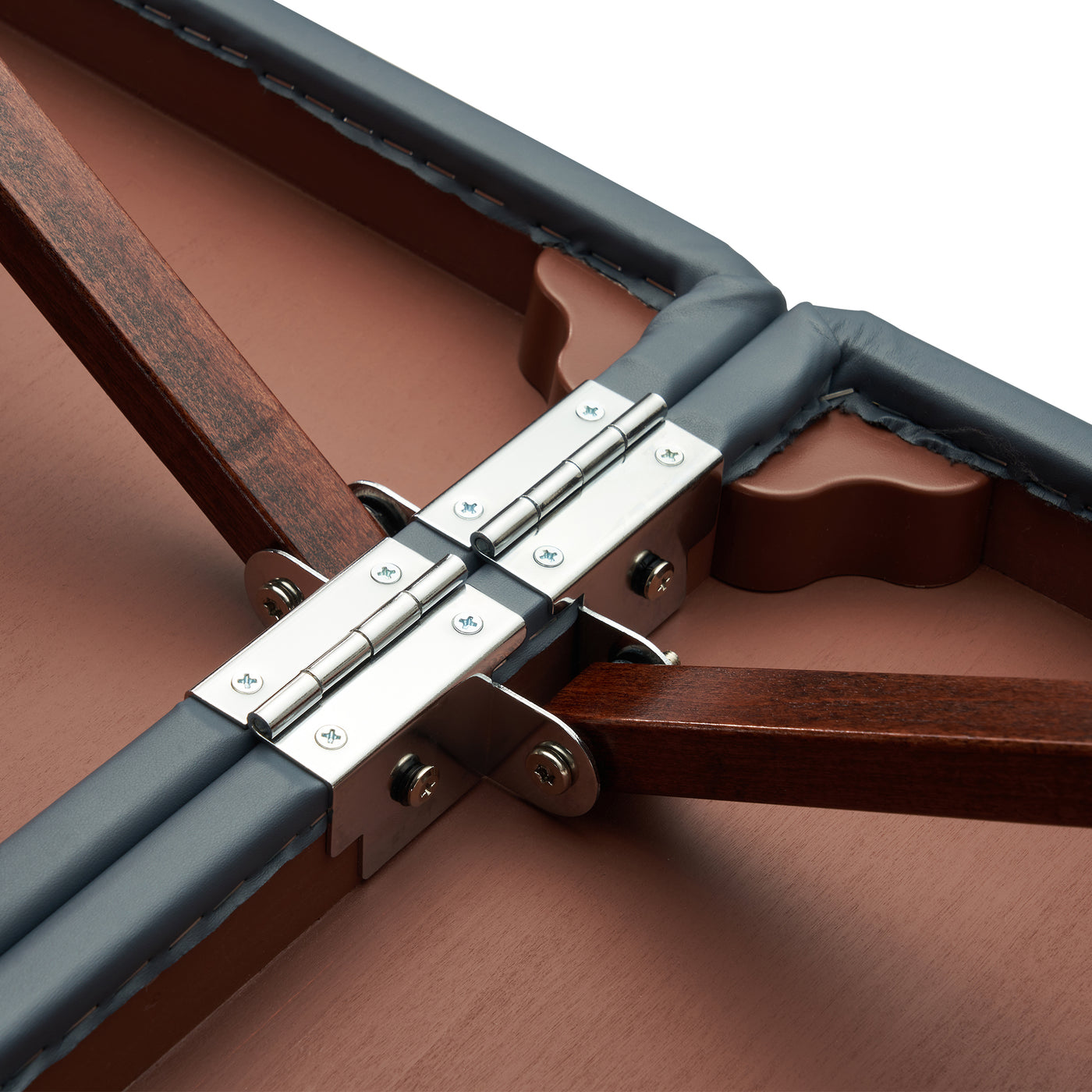 Close-up of metal hinges and wood frame on Master Massage NEWPORT Portable Massage Table.