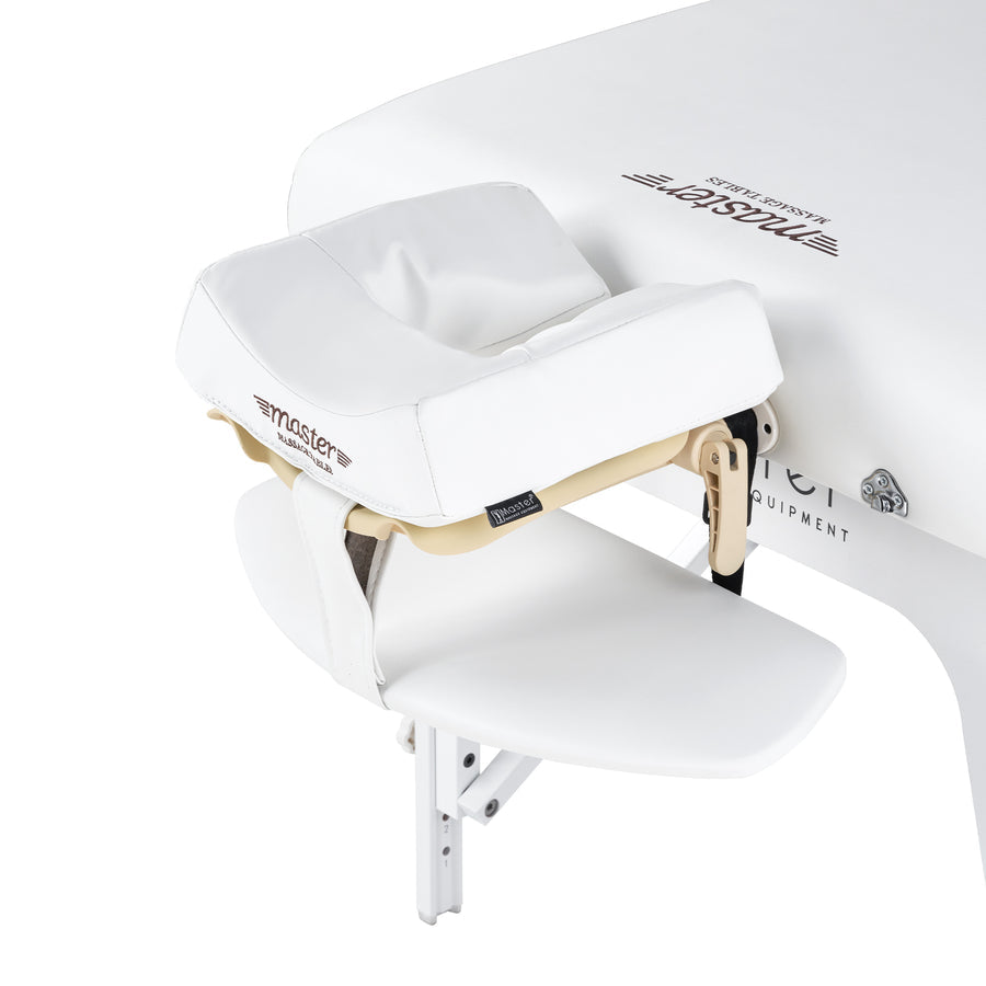 The Master Massage Montclair Pro LX has a white padded face cradle with visible metal supports.