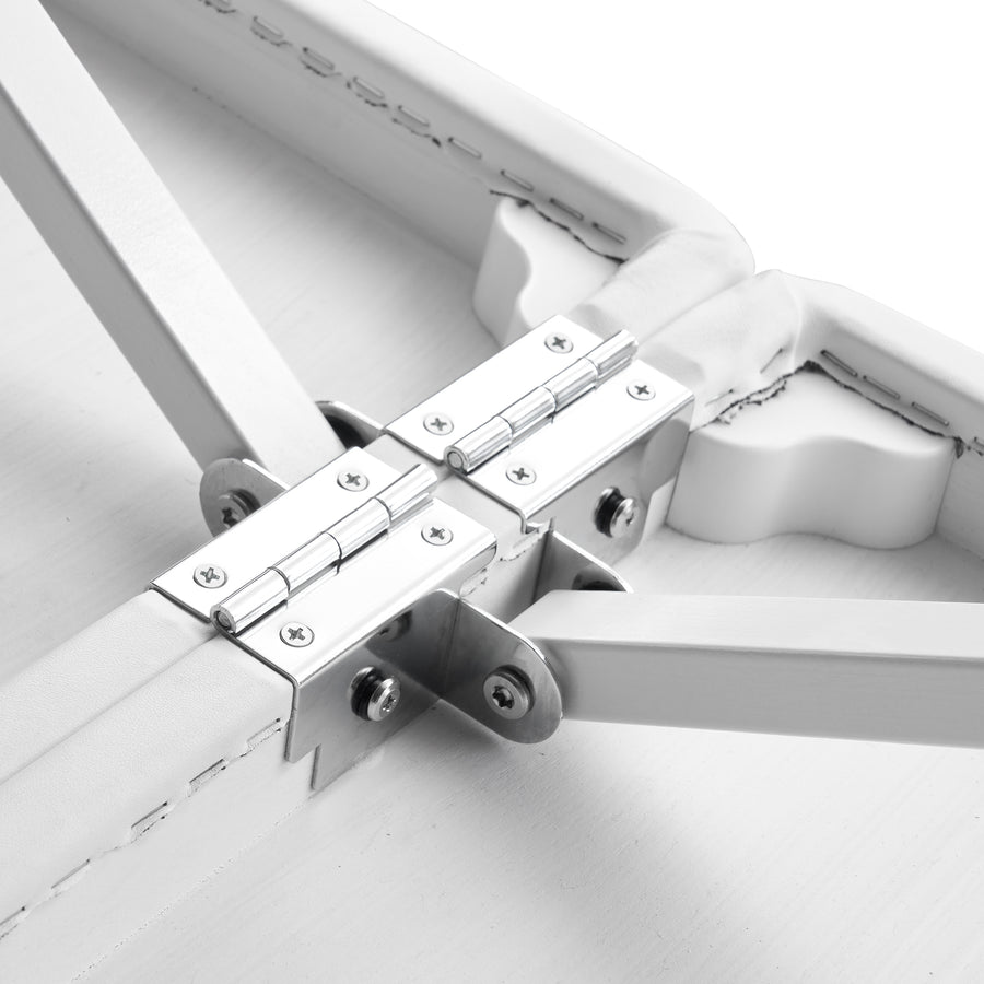 Close-up of metal hinges and support bars on the Master Massage Montclair Pro LX Table frame.