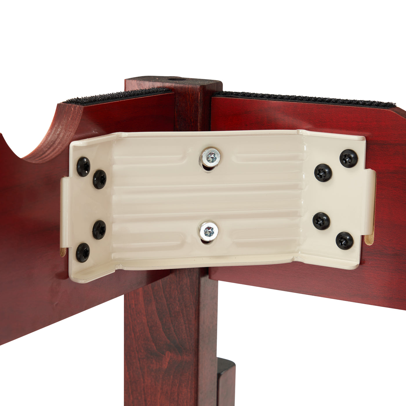 Close-up of a beige bracket with black screws on the Master Massage SPAMASTER Table frame.
