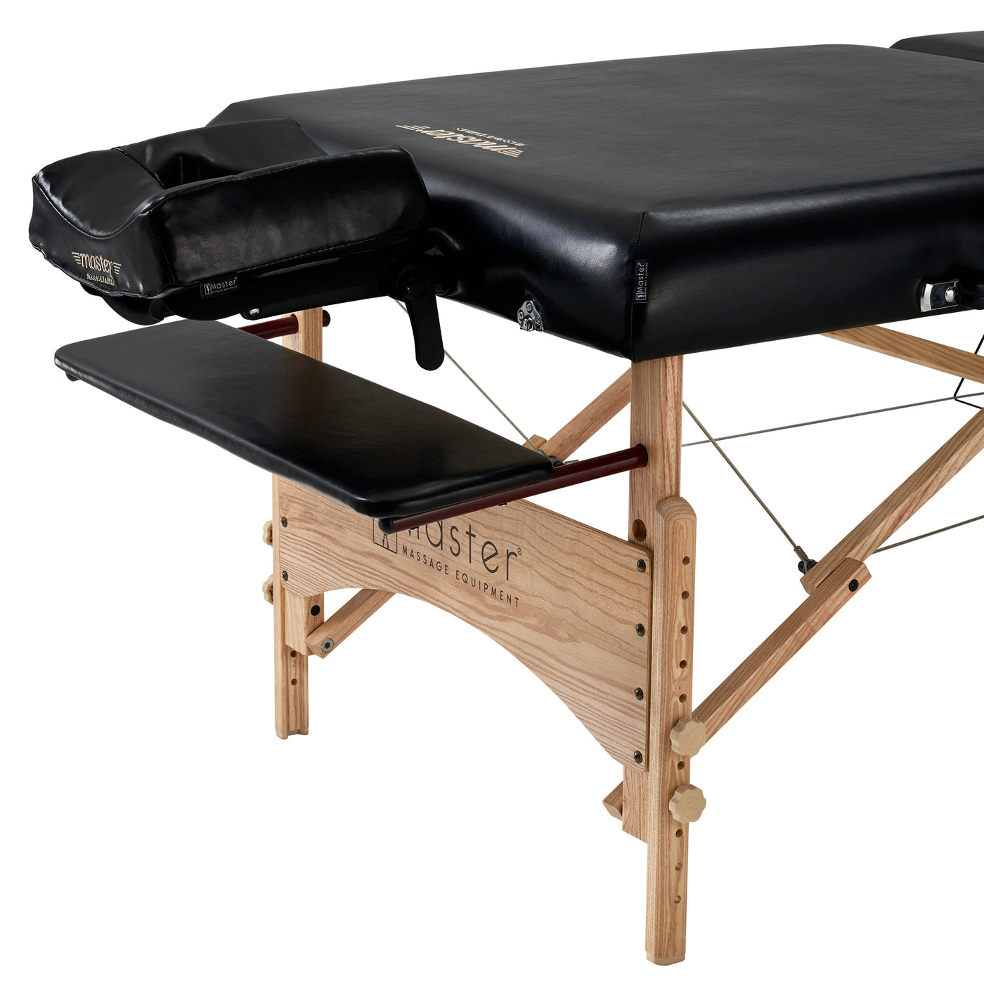 Master Massage HUSKY GIBRALTAR table with memory foam, face cradle, and wood armrest shelf.