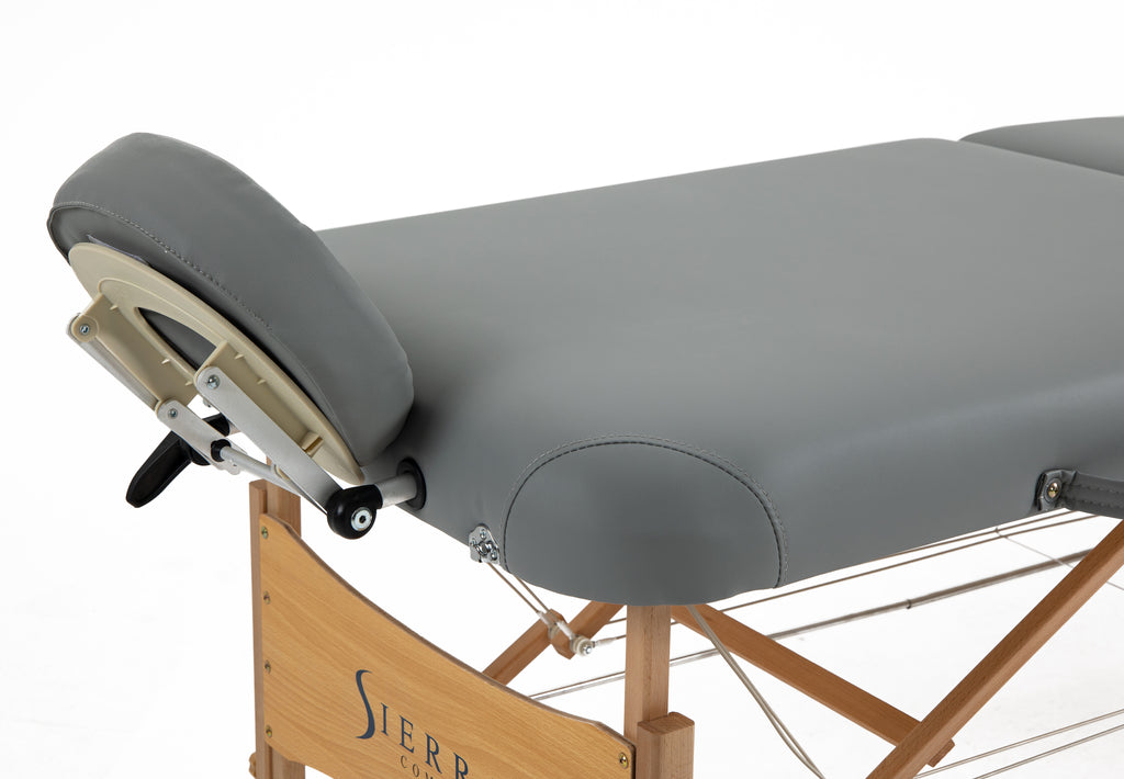 Sierra Comfort Premium Wide Portable Massage Table with gray padding and adjustable headrest.