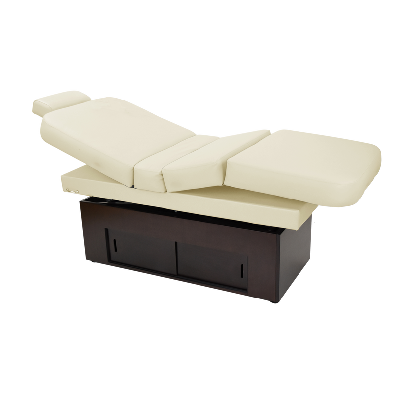 TouchAmerica SANYA POWERTILT beige motorized massage table with dark wood base for spa sessions.