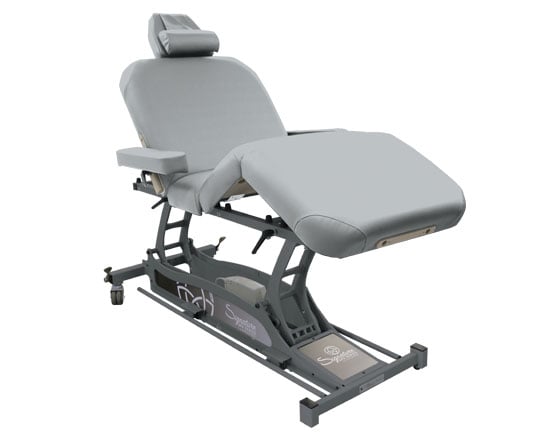 Custom Craftworks SIGNATURE SPA Hands Free Deluxe Electric Table with cushioned headrest.
