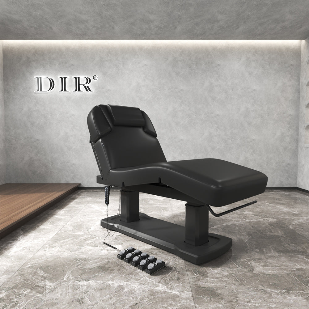 Black Tranquility massage table in a modern room with 'DIR' branding.