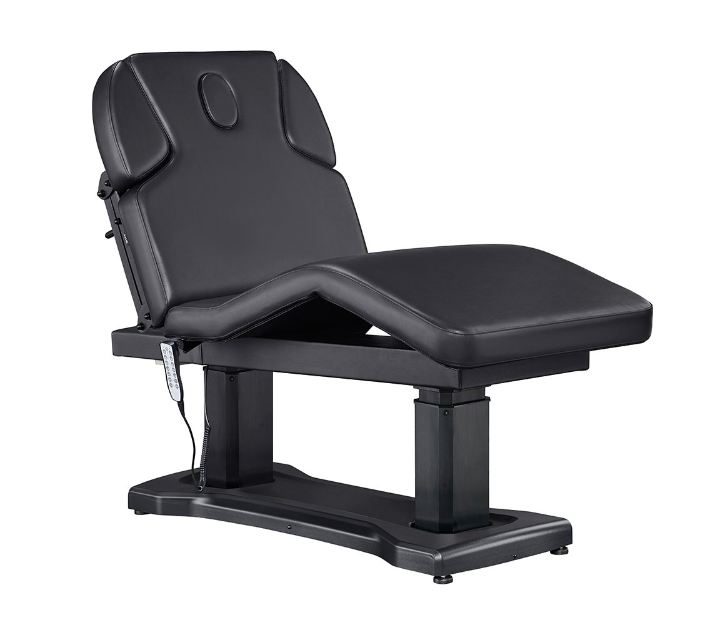 The DIR Tranquility 4 electric spa table is black with headrest and electronic controls.