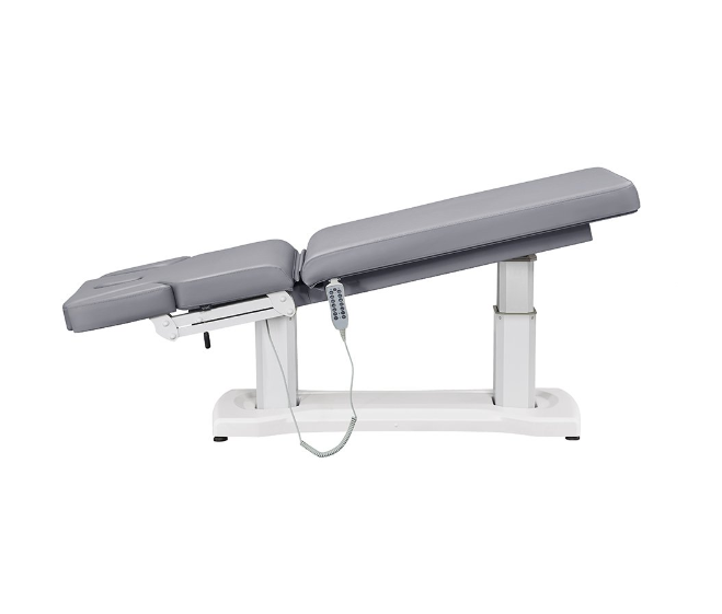 Tranquility 4 Motors Electric Medical Spa Table by DIR with gray padding, shown reclined.