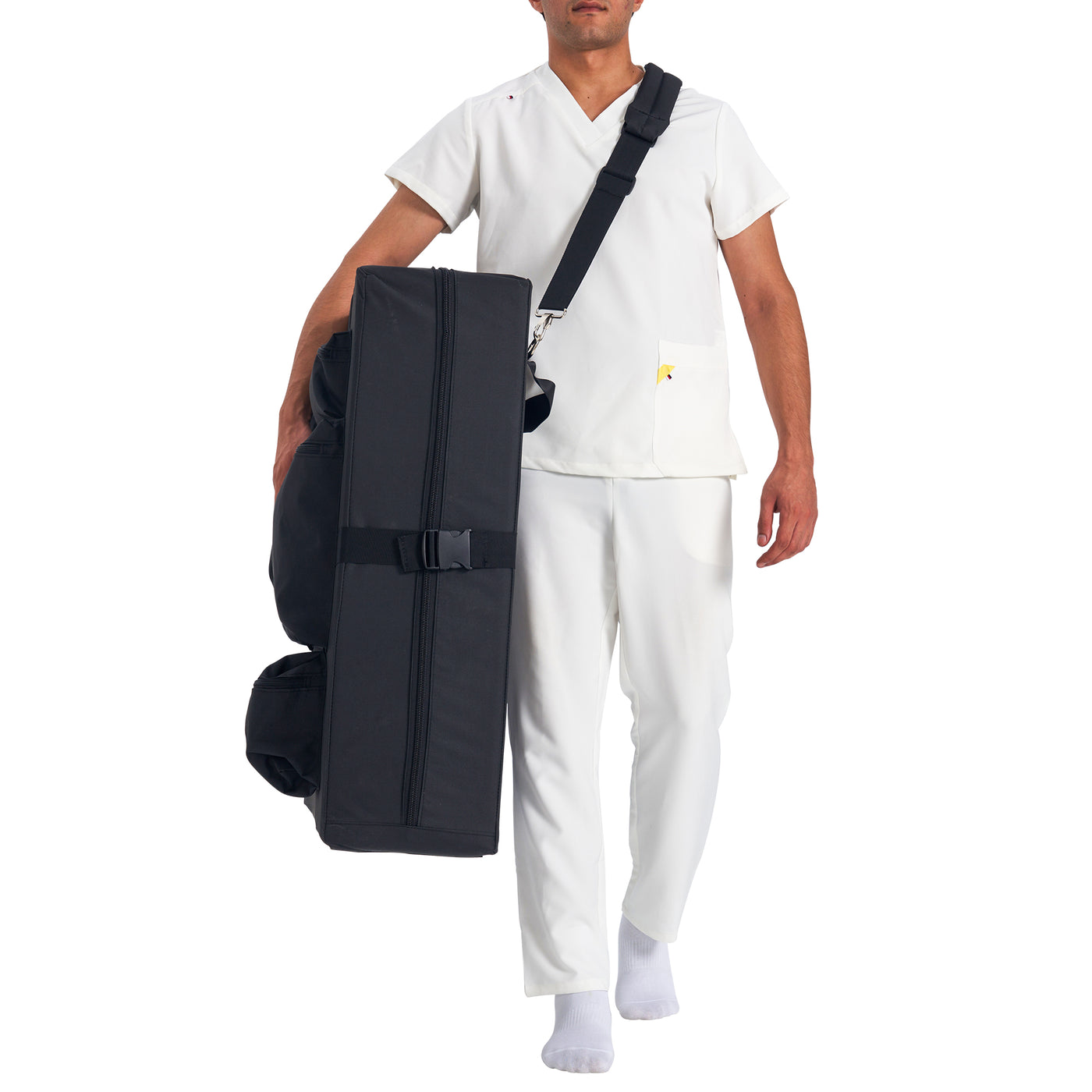Person holding a black carry case with a white background