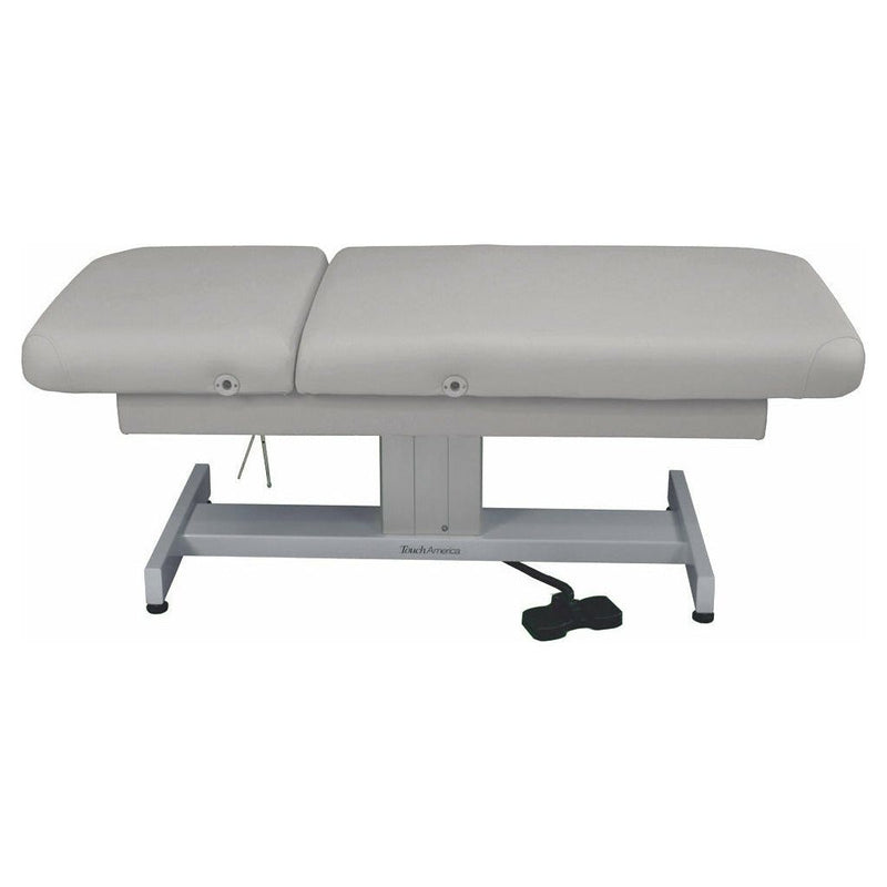 TouchAmerica VENETIAN FACE & BODY table with metal base and foot pedal for height adjustment.