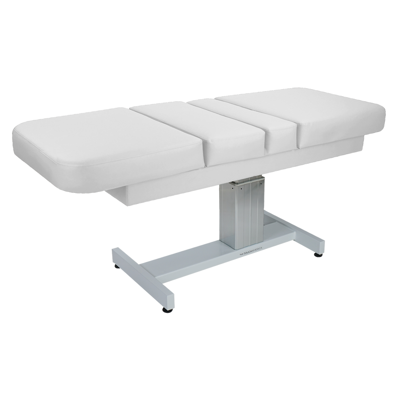 TouchAmerica VENETIAN MULTIPRO table with cushioned top and sturdy metal base for spa treatments.