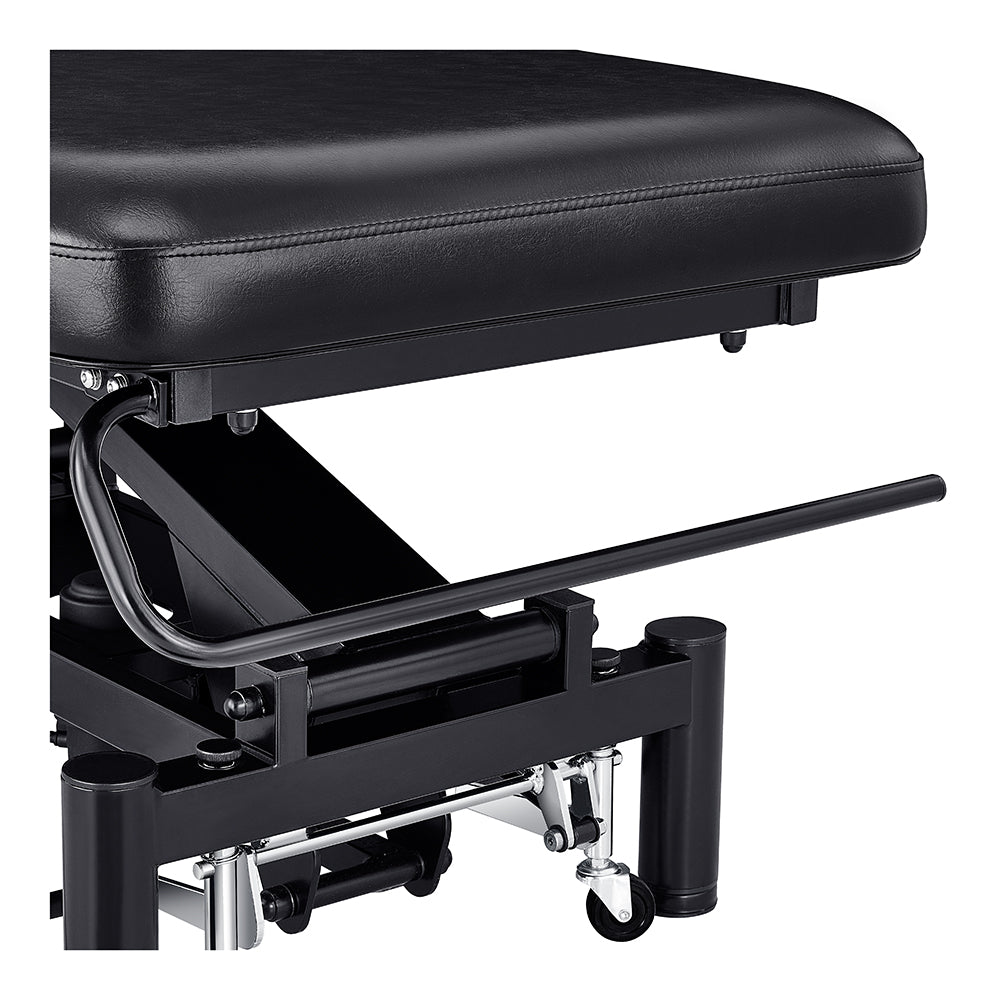 Close-up of DIR VitalEarth Spa Wellness Therapy Bed, black with lever and wheels for adjustments.