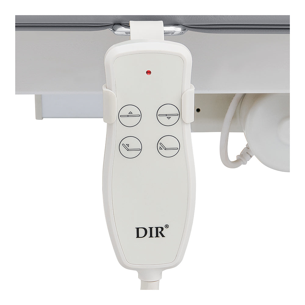 White remote with 4 buttons hangs by the DIR VitalEarth Spa Wellness Therapy Bed.