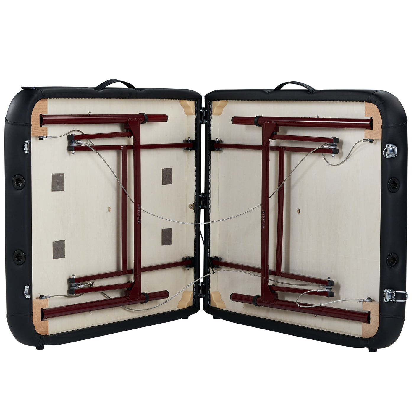 Master Massage ZEPHYR table open, displaying folded legs, hinges, and support wires inside.