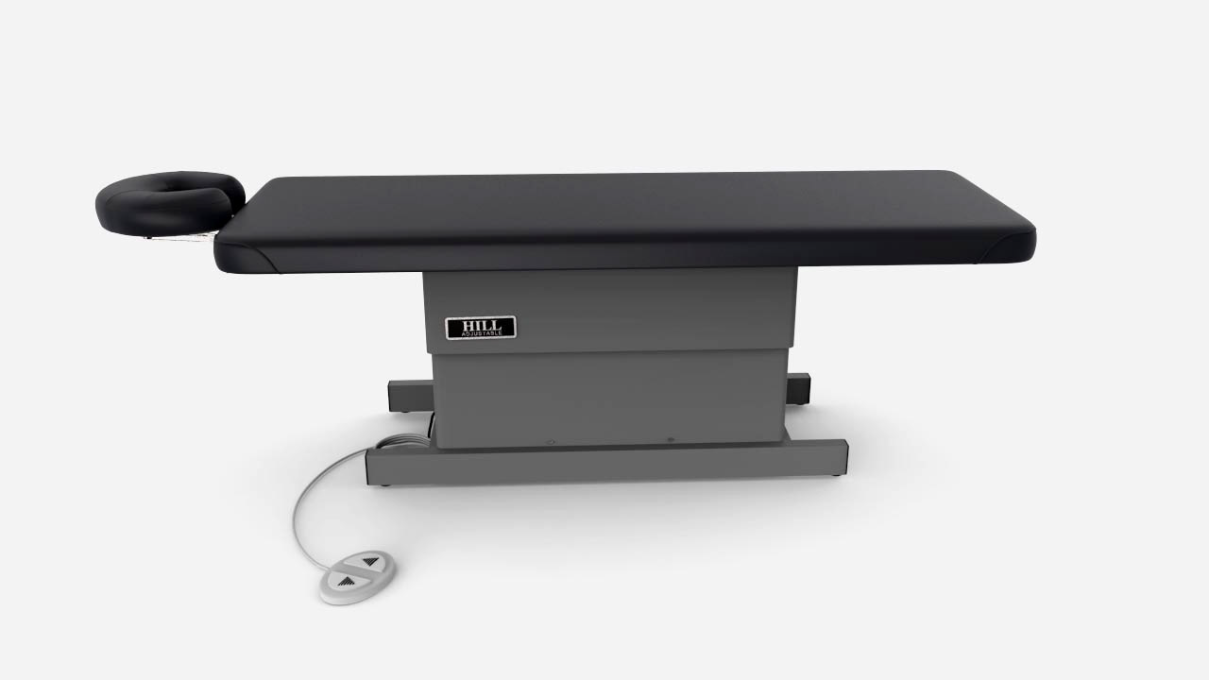 Hill Laboratories Massage Electric Lift Table with headrest, foot pedal, and multi-layer cushioning.