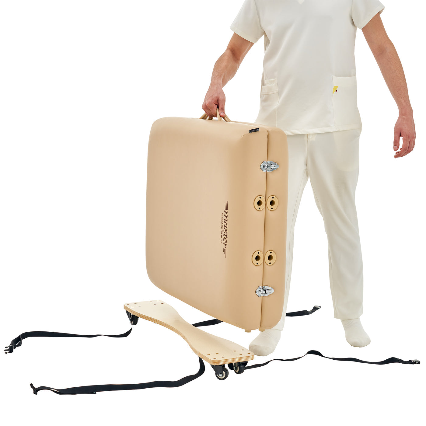 Person holding a beige massage table with table cart wheels on a white background