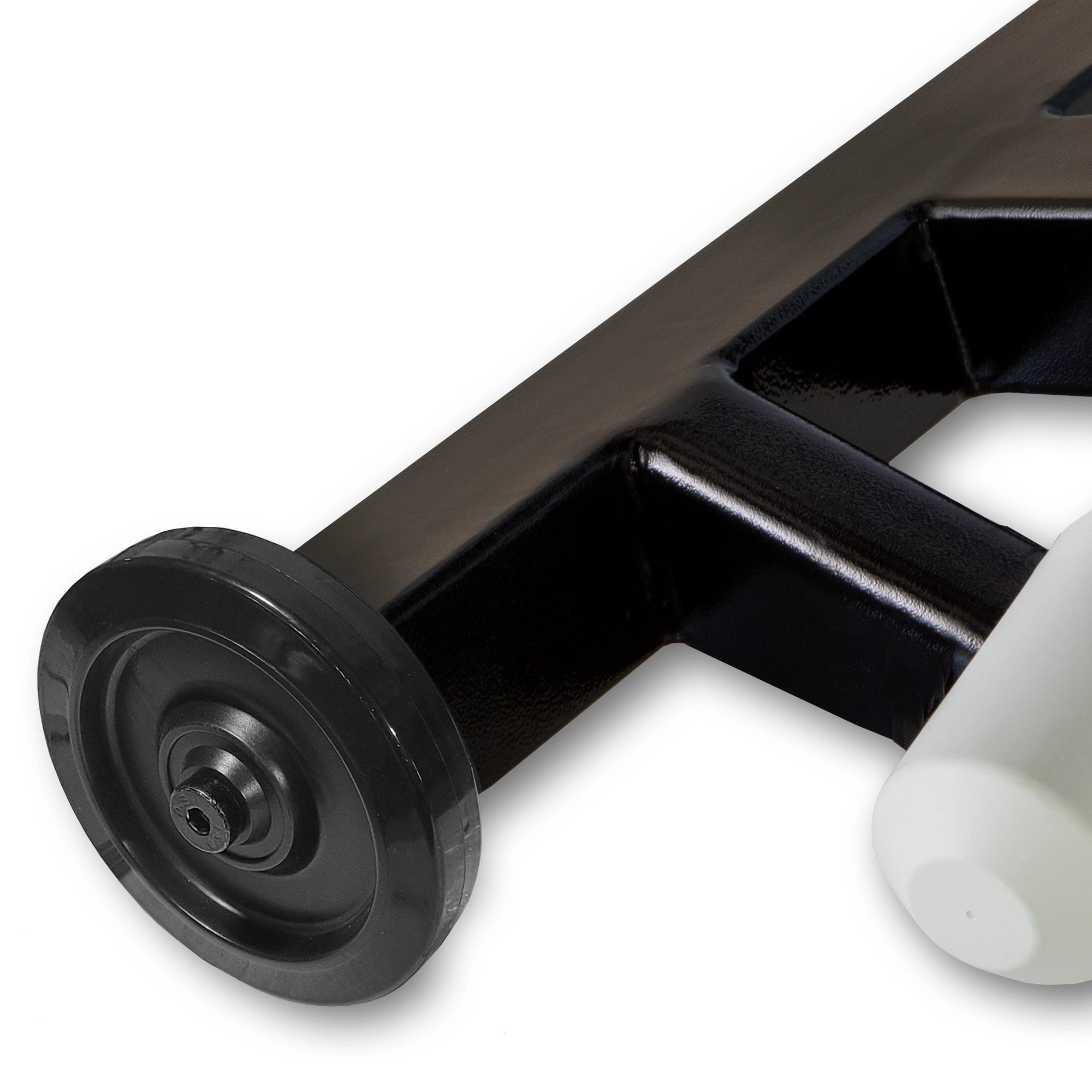 Close-up of a black metal frame component with a black wheel