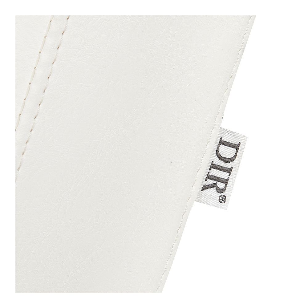 Close-up of stitched Mar Egeo 2-Motors Spa Bed by DIR, showing DIR tag at the seam.