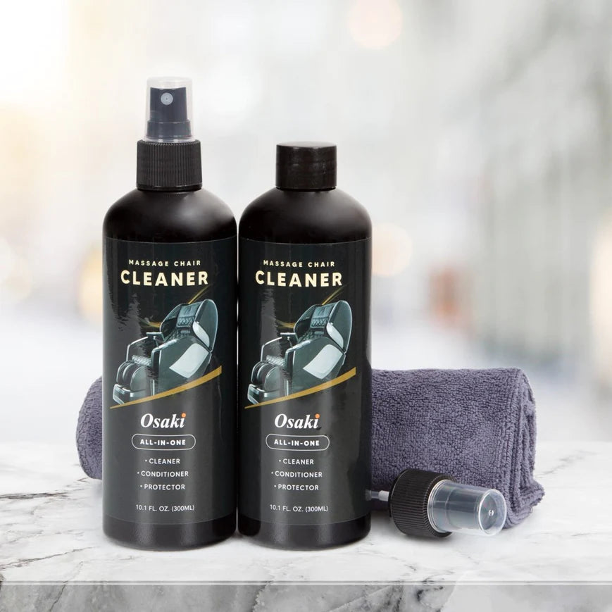Two bottles of Osaki cleaner for your Titan Vending Massage Chair and a folded towel.
