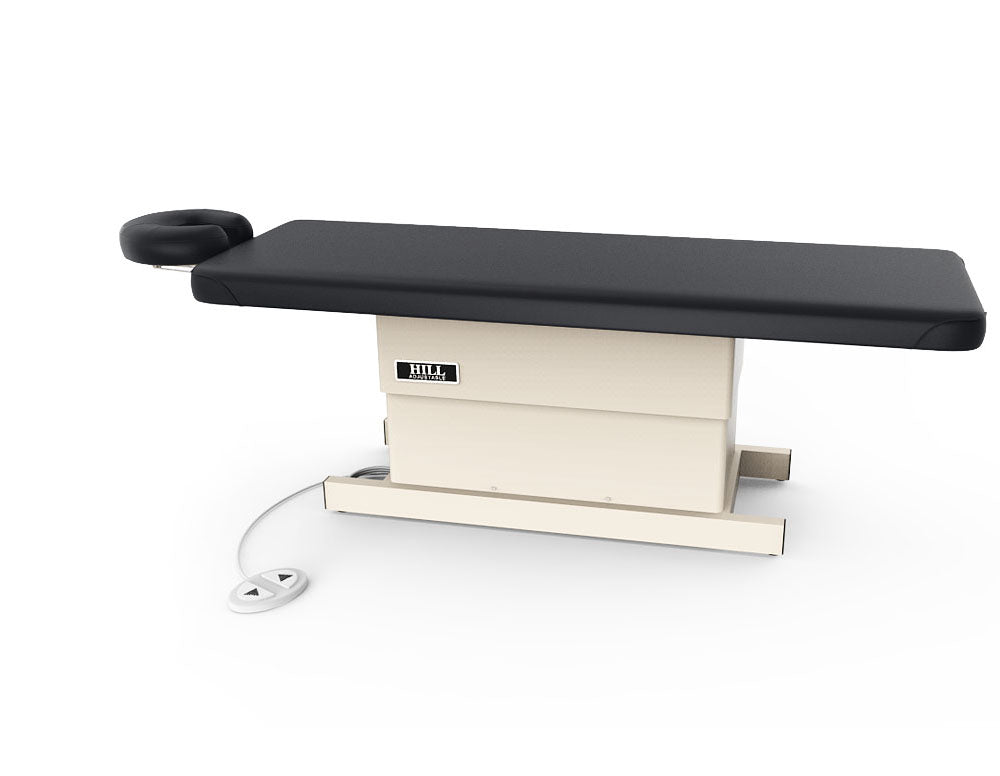 Hill Laboratories Massage Electric Lift Table with black cushioning and attached foot controls.