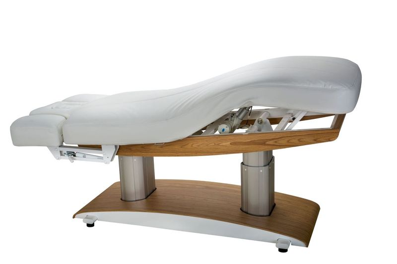 Silverfox America 2259Plus Electric Massage Table with adjustable white top and wooden base.