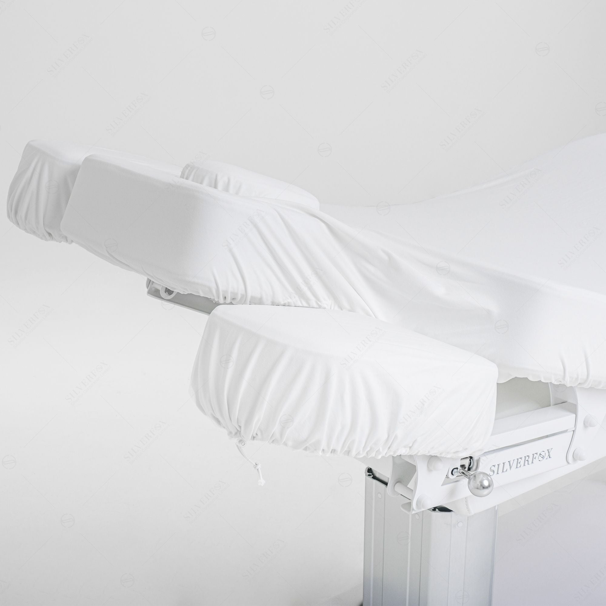Silverfox America OCILI 2249 electric massage table with adjustable cushions and fitted covers.