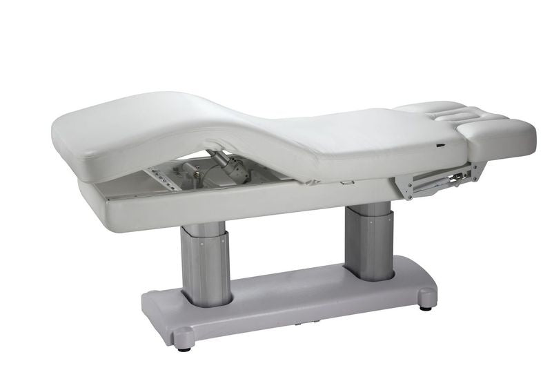 Silverfox America OCILI 2249 electric massage table with segmented cushions and metal base.