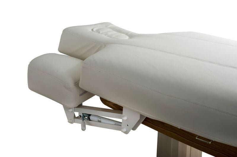 Close-up of Silverfox America 2259Plus Electric Massage Table with face cradle and padded headrest.